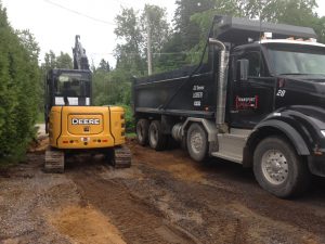 Excavation et terrassement d'entrée de garage à Mirabel, Terrebonne, Laval, Repentigny, Saint-Jérôme dans Lanaudière, Les Laurentides ou sur la Rive-Nord de Montreal / Contracteur Général Lanaudière